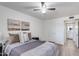Spacious bedroom with ceiling fan, neutral color palette and ensuite bathroom at 2021 E Osborn Rd # 9, Phoenix, AZ 85016