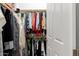 Closet featuring a full rack of hanging clothes and shelf with overhead storage at 20563 W Edgemont Ave, Buckeye, AZ 85396