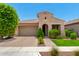 Charming single-story home featuring low maintenance landscaping, a two-car garage, and stylish curb appeal at 20563 W Edgemont Ave, Buckeye, AZ 85396