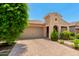 Charming single-story home featuring low maintenance landscaping, a two-car garage, and stylish curb appeal at 20563 W Edgemont Ave, Buckeye, AZ 85396