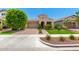 Charming single-story home featuring low maintenance landscaping, a two-car garage, and stylish curb appeal at 20563 W Edgemont Ave, Buckeye, AZ 85396