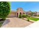 Charming single-story home featuring low maintenance landscaping, a two-car garage, and stylish curb appeal at 20563 W Edgemont Ave, Buckeye, AZ 85396