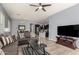 Relaxing living room showcasing an open floor plan connecting the kitchen and dining areas at 20563 W Edgemont Ave, Buckeye, AZ 85396