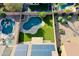 Aerial view of the home featuring a backyard pool, desert landscaping, solar panels, and perimeter fencing at 20722 N 38Th St, Phoenix, AZ 85050