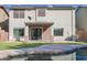 Backyard view showcasing a sparkling pool and custom patio, perfect for Gathering gatherings and outdoor living at 20722 N 38Th St, Phoenix, AZ 85050
