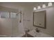 Bathroom features vanity, sink, mirror, shower, and tile floors at 20722 N 38Th St, Phoenix, AZ 85050