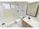 Modern bathroom with glass shower, wood vanity, and updated fixtures for a spa-like experience at 20722 N 38Th St, Phoenix, AZ 85050