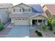Two-story home featuring desert landscaping, neutral color palette, a two car garage, and solar panels at 20722 N 38Th St, Phoenix, AZ 85050