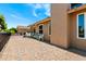 Paver patio ideal for outdoor seating and entertainment in a fenced backyard at 2488 Leisure World --, Mesa, AZ 85206