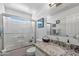 Clean bathroom featuring a shower over tub and granite vanity at 2488 Leisure World --, Mesa, AZ 85206
