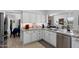 Charming kitchen with stainless appliances, granite counters and white cabinets at 2488 Leisure World --, Mesa, AZ 85206