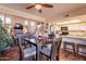 Open concept dining area flowing into the living and kitchen areas, providing an airy and connected living space at 2524 S El Paradiso -- # 17, Mesa, AZ 85202