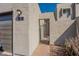 Attractive entryway with private gate, desert landscaping, and a convenient garage at 2524 S El Paradiso -- # 17, Mesa, AZ 85202