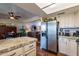 Open kitchen flows into the dining and living areas, great for entertaining at 2524 S El Paradiso -- # 17, Mesa, AZ 85202