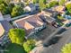 Aerial view of home with solar panels and mature landscaping at 3220 W Frankfurt Dr, Chandler, AZ 85226