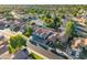 A picturesque aerial view of a vibrant suburban neighborhood with lush greenery and well-maintained homes at 3220 W Frankfurt Dr, Chandler, AZ 85226