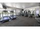 A well-equipped gym with treadmills, elliptical machines, and weights, offering a full-body workout at 3330 W Danbury Dr # E203, Phoenix, AZ 85053