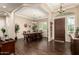 Elegant dining room featuring stylish decor and wood flooring at 3614 W Phillips Rd, San Tan Valley, AZ 85144
