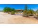Landscape view showing the desert-style setting and attractive curb appeal at 3614 W Phillips Rd, San Tan Valley, AZ 85144