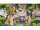 Aerial view of a beautiful home with a pool and unique turf area at 3946 N Pinnacle Hills Cir, Mesa, AZ 85207