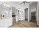 Bright and airy bathroom with dual sinks, a vanity area, and tile floors, perfect for a refreshing start at 3946 N Pinnacle Hills Cir, Mesa, AZ 85207