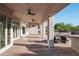 Inviting covered patio with a pool, and lounge chairs, ideal for relaxing outdoors at 3946 N Pinnacle Hills Cir, Mesa, AZ 85207