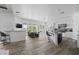 Modern kitchen featuring a marble island, stainless steel appliances, and a breakfast bar with seating at 3946 N Pinnacle Hills Cir, Mesa, AZ 85207