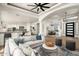 Open floor plan showcasing the living room, kitchen, dining area, and modern decor at 3946 N Pinnacle Hills Cir, Mesa, AZ 85207