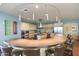 Large kitchen features bar seating, ample cabinets, modern appliances, and plenty of counter space at 3977 E Cat Balue Dr, Phoenix, AZ 85050
