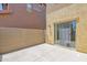 Private patio with concrete tile and sliding door access into the property at 3977 E Cat Balue Dr, Phoenix, AZ 85050