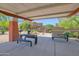 Community picnic area featuring benches, barbecue grills and desert landscaping at 3977 E Cat Balue Dr, Phoenix, AZ 85050