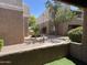 Exterior view of buildings with gravel, trees and flowers at 4554 E Paradise Village Pkwy # 149, Phoenix, AZ 85032