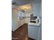 Bright kitchen featuring white cabinets, stainless steel appliances, and modern countertops at 4554 E Paradise Village Pkwy # 149, Phoenix, AZ 85032