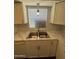 Kitchen sink with modern fixtures, bright window and bright countertops at 4554 E Paradise Village Pkwy # 149, Phoenix, AZ 85032