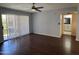 Bright living room with wood floors and sliding door to the outside at 4554 E Paradise Village Pkwy # 149, Phoenix, AZ 85032