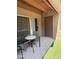 Small, private patio with table and chairs at 4554 E Paradise Village Pkwy # 149, Phoenix, AZ 85032
