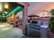 Outdoor space featuring a built-in grill, covered patio and a gazebo by the pool at 46065 W Meadows Ln, Maricopa, AZ 85139