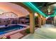 Backyard features a covered patio, pool, gazebo, and well-manicured landscaping at 46065 W Meadows Ln, Maricopa, AZ 85139