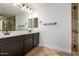 Updated bathroom with double sinks, updated hardware and shower with tile surround at 46065 W Meadows Ln, Maricopa, AZ 85139