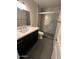 Contemporary bathroom featuring modern vanity and a glass-enclosed shower with stylish tiling at 4701 N 68Th St # 105, Scottsdale, AZ 85251