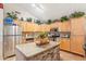 Kitchen featuring stainless steel appliances, granite countertops, and a stone island at 4726 W Indian School Rd, Phoenix, AZ 85031