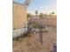 Enclosed backyard area with a chain-link fence offers privacy and security for outdoor activities at 5601 W Missouri Ave # 63, Glendale, AZ 85301