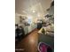 Functional kitchen offers ample countertop space, essential appliances, and shelving for organized storage at 5601 W Missouri Ave # 63, Glendale, AZ 85301