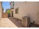 Exterior view of a backyard featuring AC unit at 5812 W Illini St, Phoenix, AZ 85043