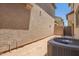 Exterior view of a backyard featuring AC unit at 5812 W Illini St, Phoenix, AZ 85043