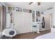 Bedroom with posters on the wall and closet with sliding doors at 7031 W Lone Tree Trl, Peoria, AZ 85383