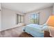 Bedroom with carpet flooring and a bright window at 7526 W Cheryl Dr, Peoria, AZ 85345