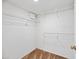 Walk-in closet features wire shelving for ample storage at 7526 W Cheryl Dr, Peoria, AZ 85345