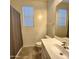 Well-lit bathroom with a single sink vanity, tile floors, and a shower-tub combo at 7925 S 24Th Way, Phoenix, AZ 85042