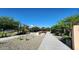 Community park featuring shaded playground, picnic tables, and walking path, creating a relaxing and social space at 7925 S 24Th Way, Phoenix, AZ 85042